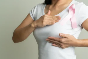 pink badge ribbon woman chest support breast cancer cause breast cancer awareness concept scaled 1 pink badge ribbon woman chest support breast cancer cause breast cancer awareness concept scaled 1
